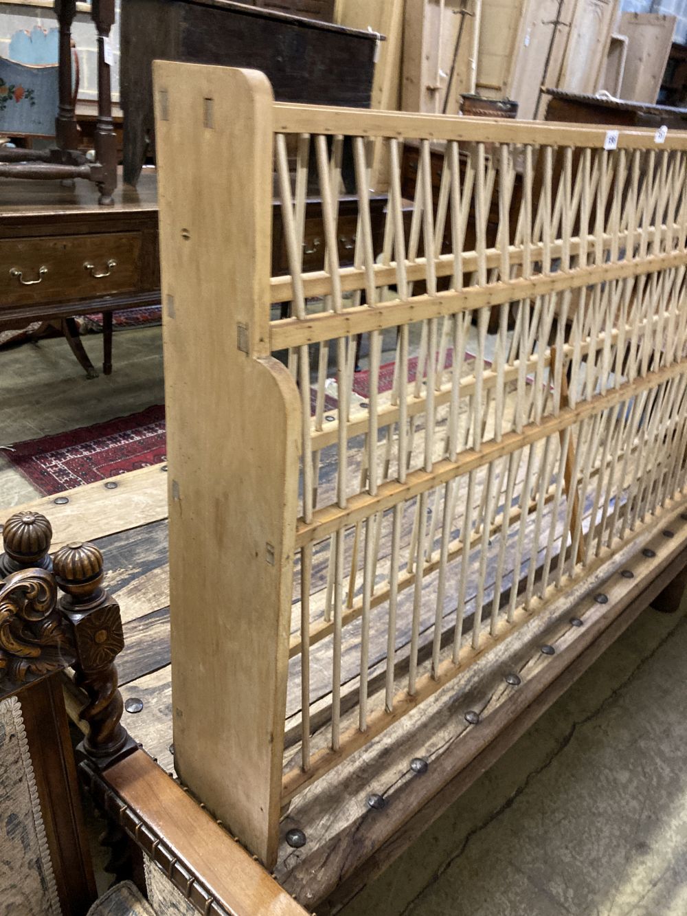 A large Victorian pine plate rack, width 172cm depth 20cm height 88cm